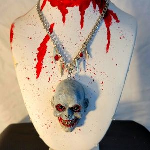 Vampire face necklace